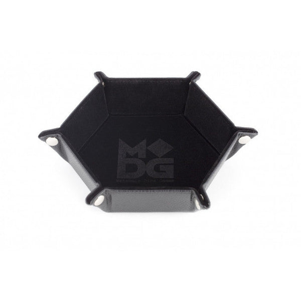 A black hexagon fold up dice tray with the MDG logo on it.